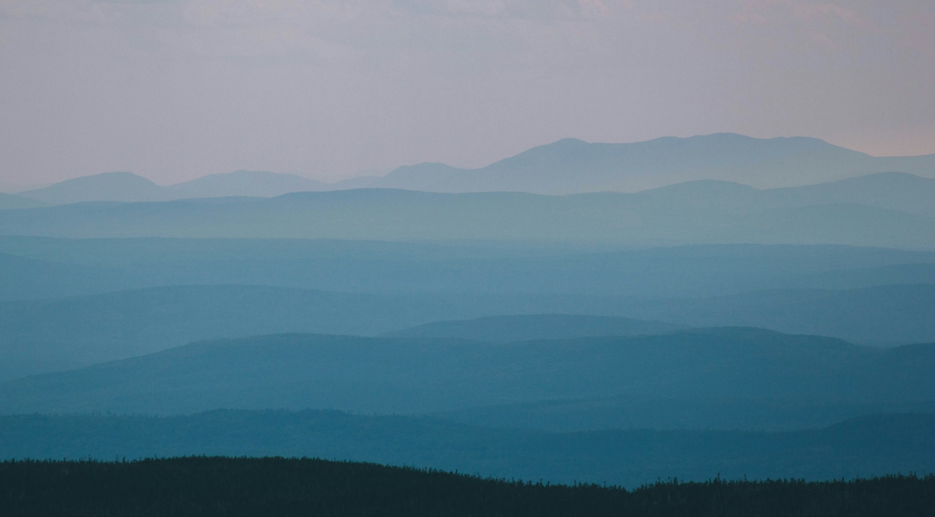 Layered mountain landscape representing structured capital allocation